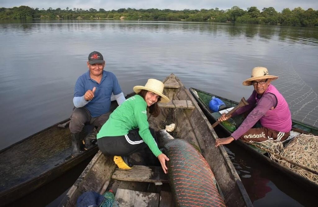 A group in canoes fish farming, from an aquaculture job-seeker.